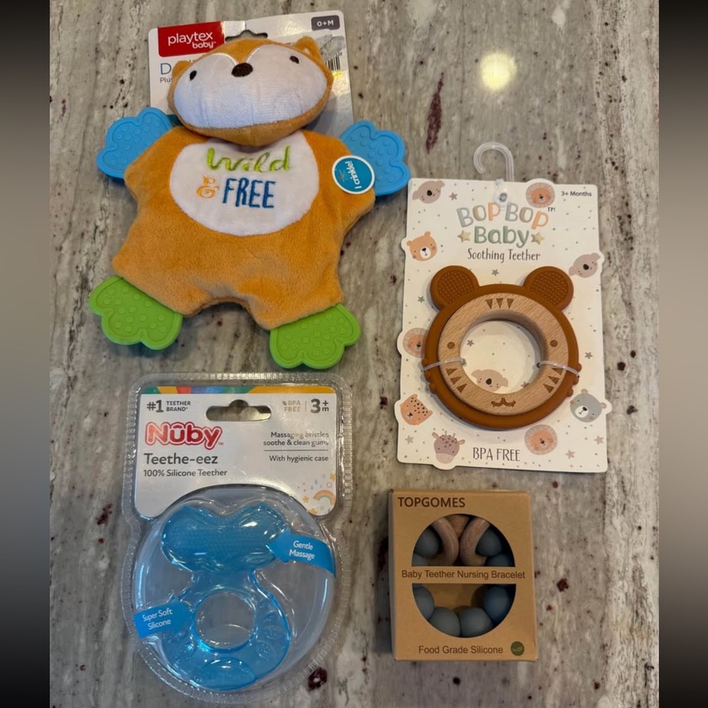 4 brand new Teether toys